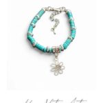 Bransoletka z kamieni turkusu oraz zawieszką. 17 cm + przedłużka.