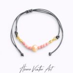 Bransoletka z perłą na regulowanym rzemyku