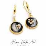 Kolczyki z mini gaurą w ciemnobrązowej żywicy